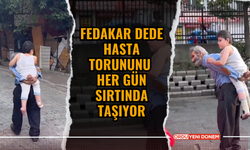 Fedakar dede hasta torununu her gün sırtında taşıyor